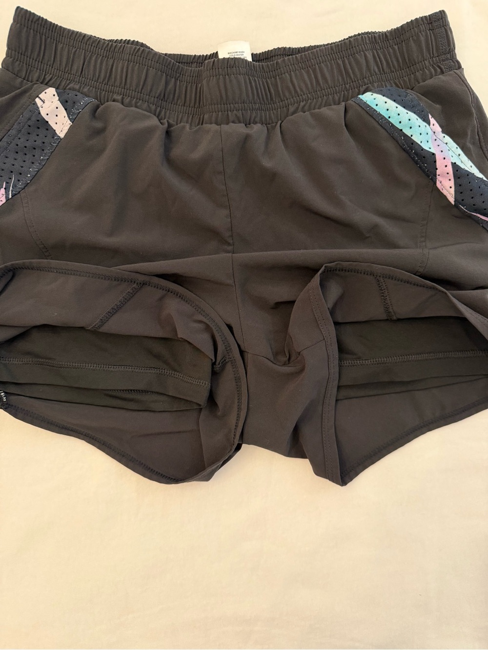 Sofibella Black Women's Active Tennis Shorts side Panel accents in Pastel color - Picture 6 of 7
